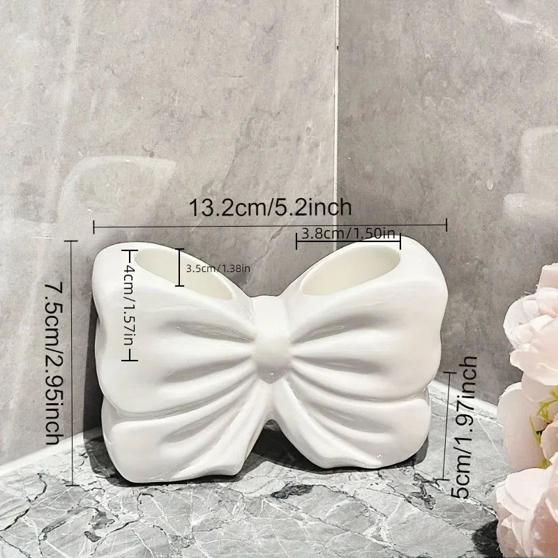 Charming bow ceramic toothbrush holder